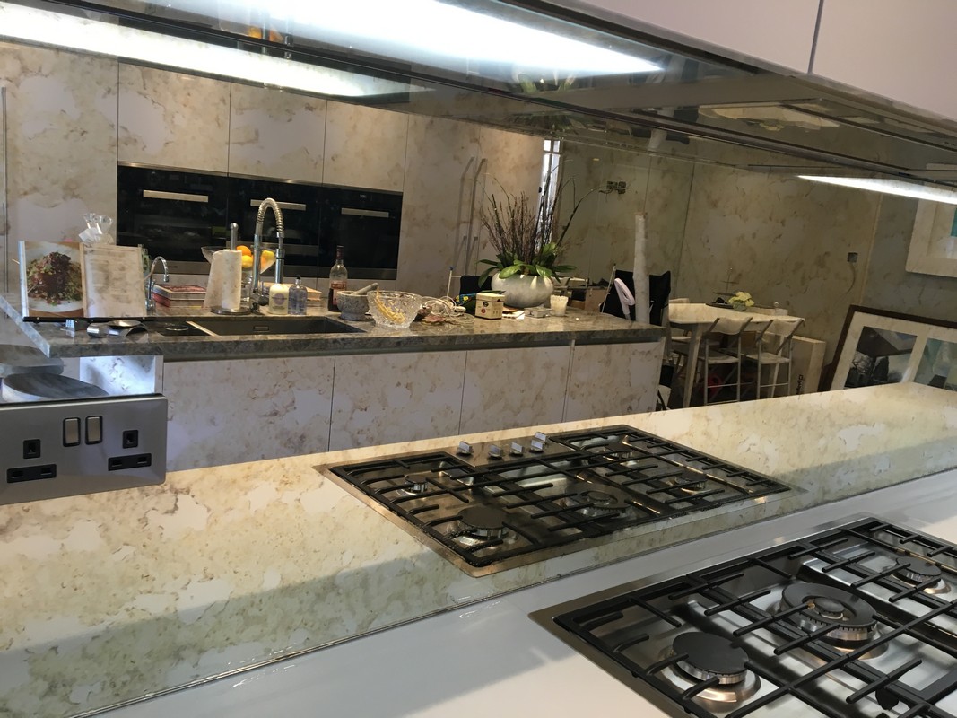 Mirror glass splashback in Hampstead luxury kitchen